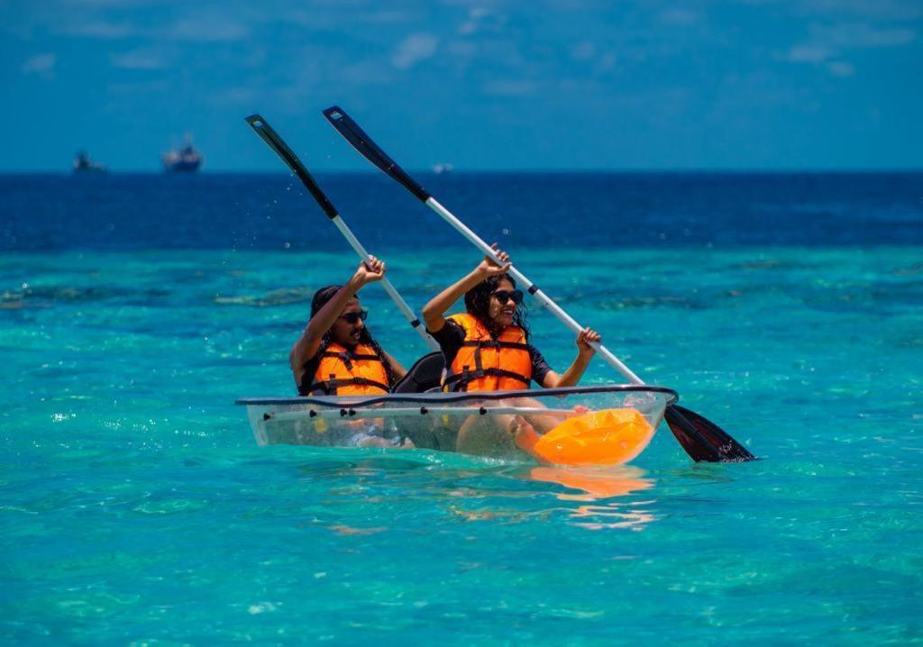 Ihaven Thulusdhoo Hotel Bagian luar foto