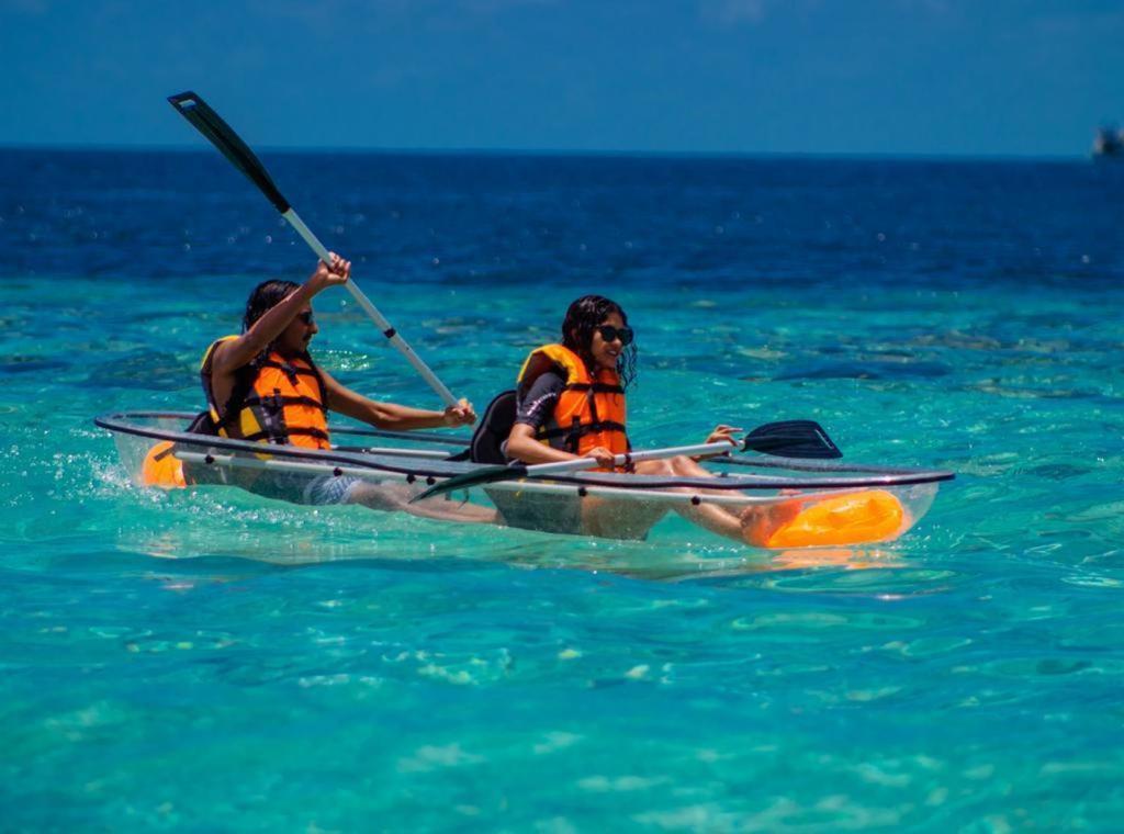 Ihaven Thulusdhoo Hotel Bagian luar foto